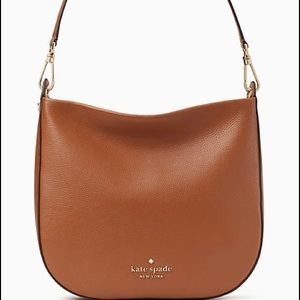 Lexy shoulder bag, brand new in box. accidentally bought 2 and could not return.